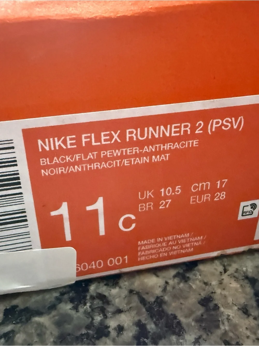 Nike Black Kids' Slip-On Sneakers with Silver Swoosh